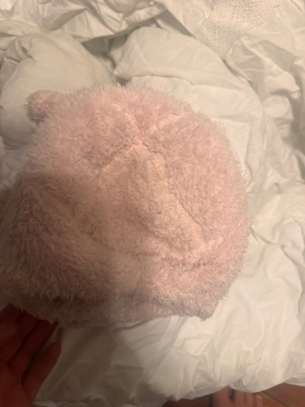 North Face Baby Bear Suave Oso Beanie in pink with a prominently displayed woven